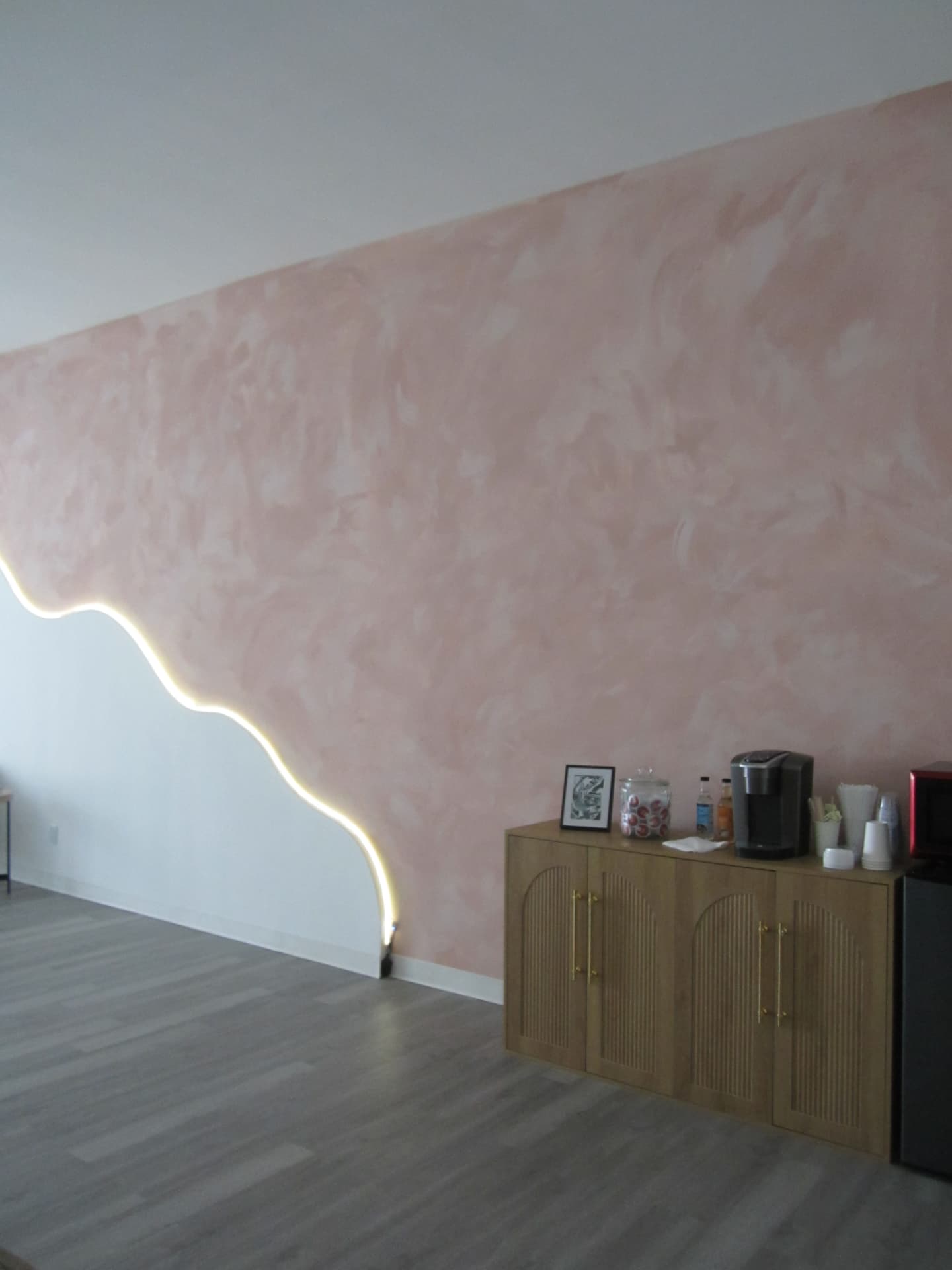 Accent wall and wooden refreshment cabinet