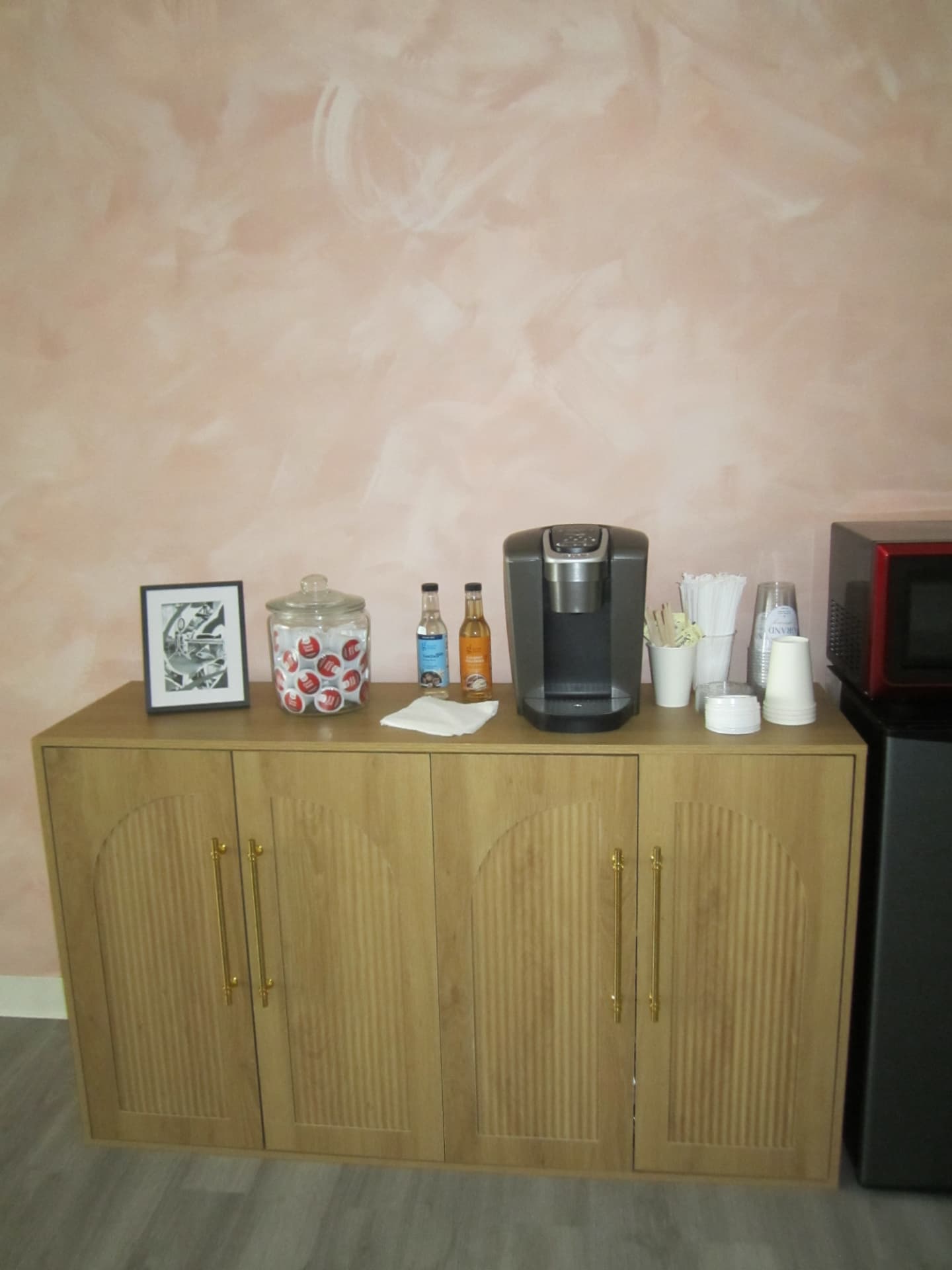 Refreshment cabinet with coffee station